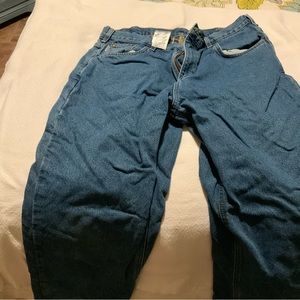 Carhartt fully lined relaxed fit jeans, practically new!